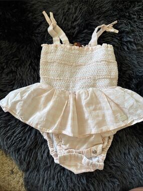 7 for all man kind Light Pink Smocked Baby Peplum Romper